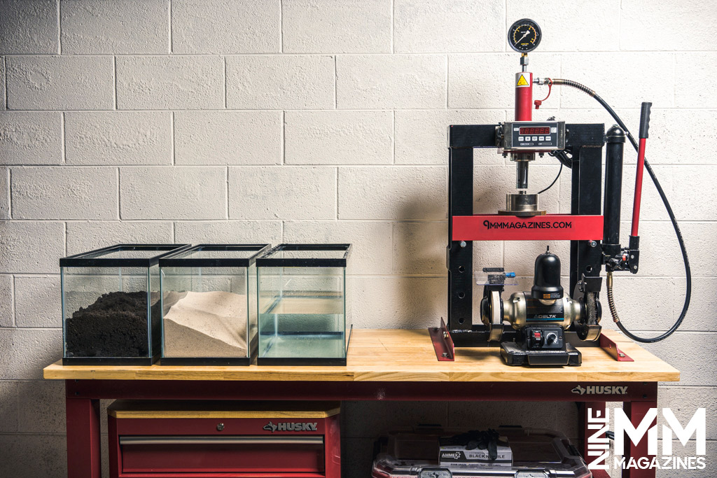 a photo of tools and equipment for gun magazine testing