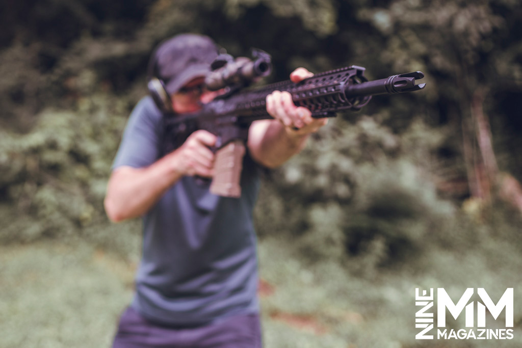 a photo of a man shooting a 308 rifle