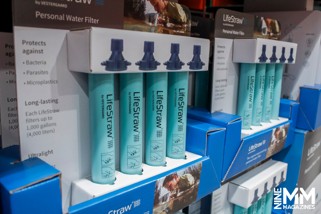 a photo of personal water filters on a store shelf