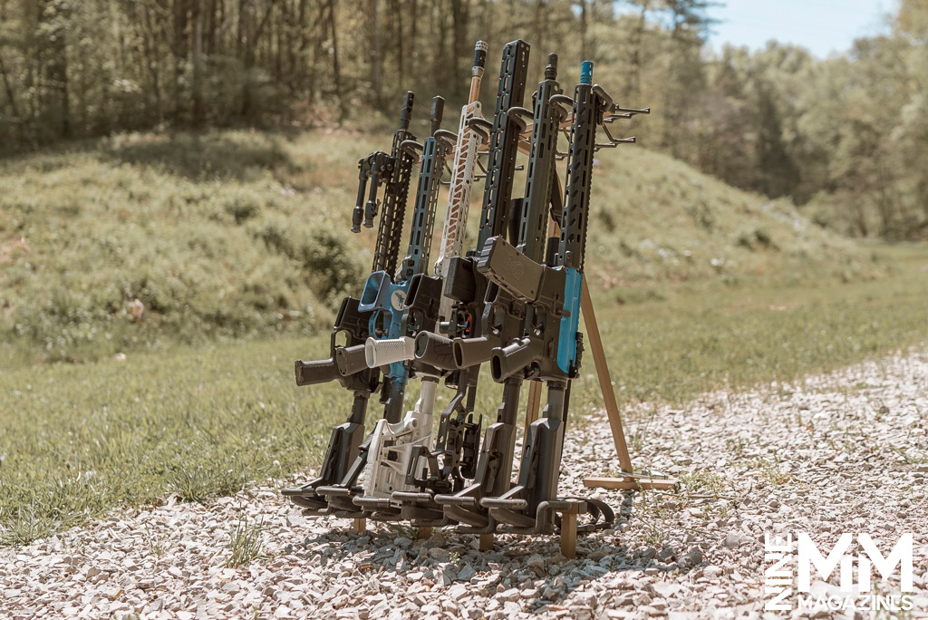 a photo of rifles on a gun range