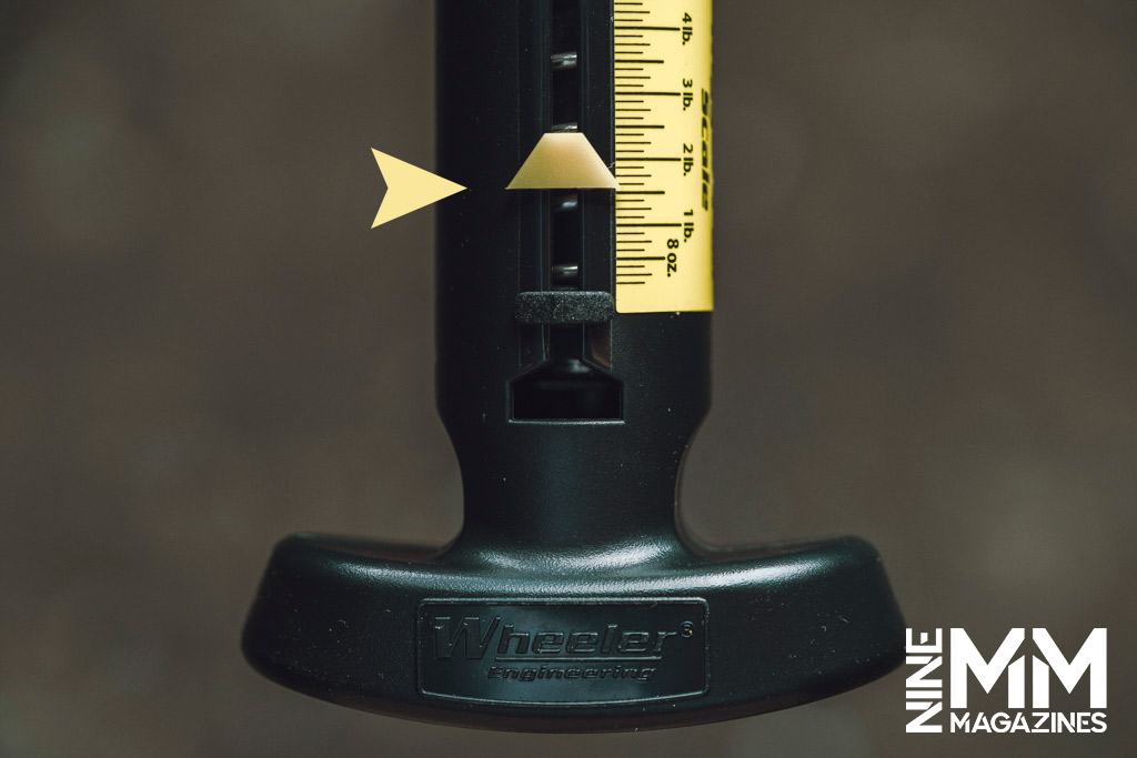 a close up photo of a weight measurement