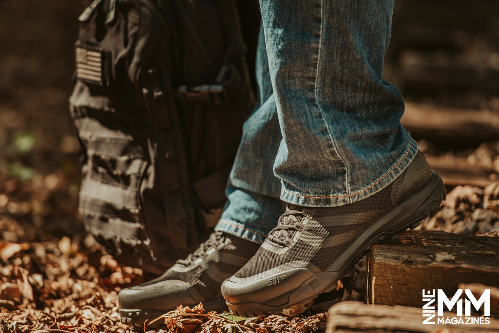 a photo of a man hiking outdoors