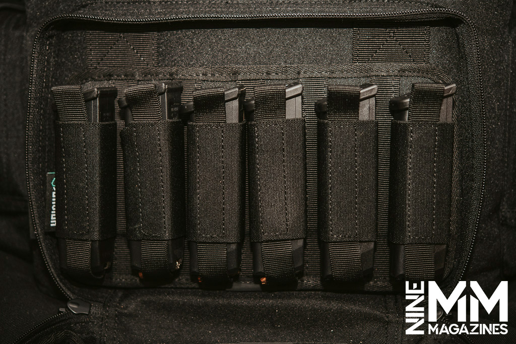 a photo of glock magazines in a range bag