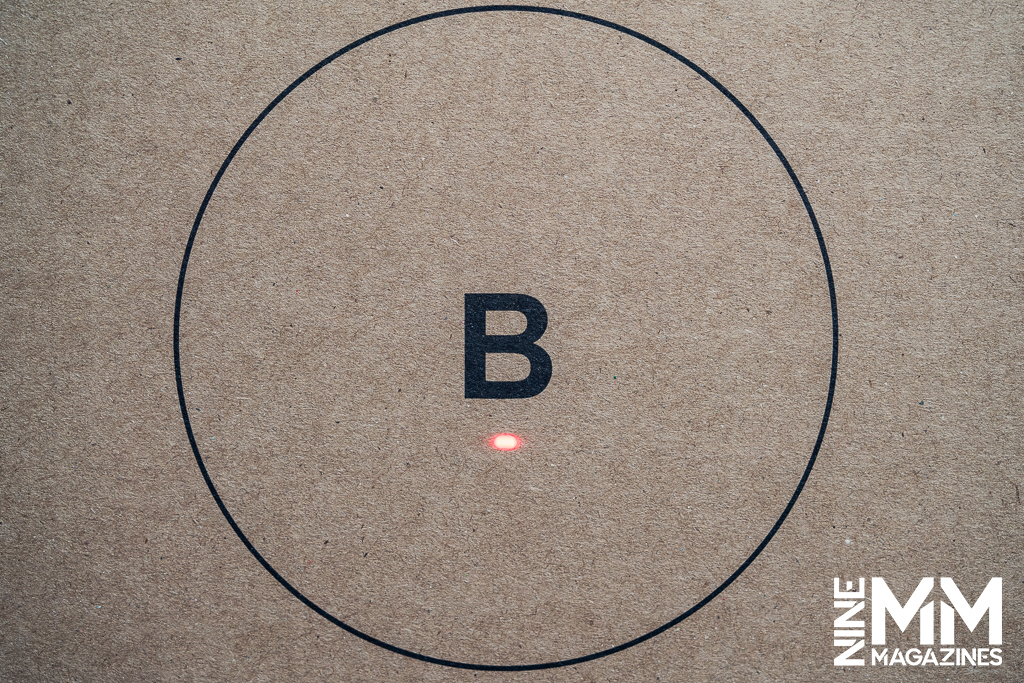 a target with a laser on it a photo of a target with a laser on it