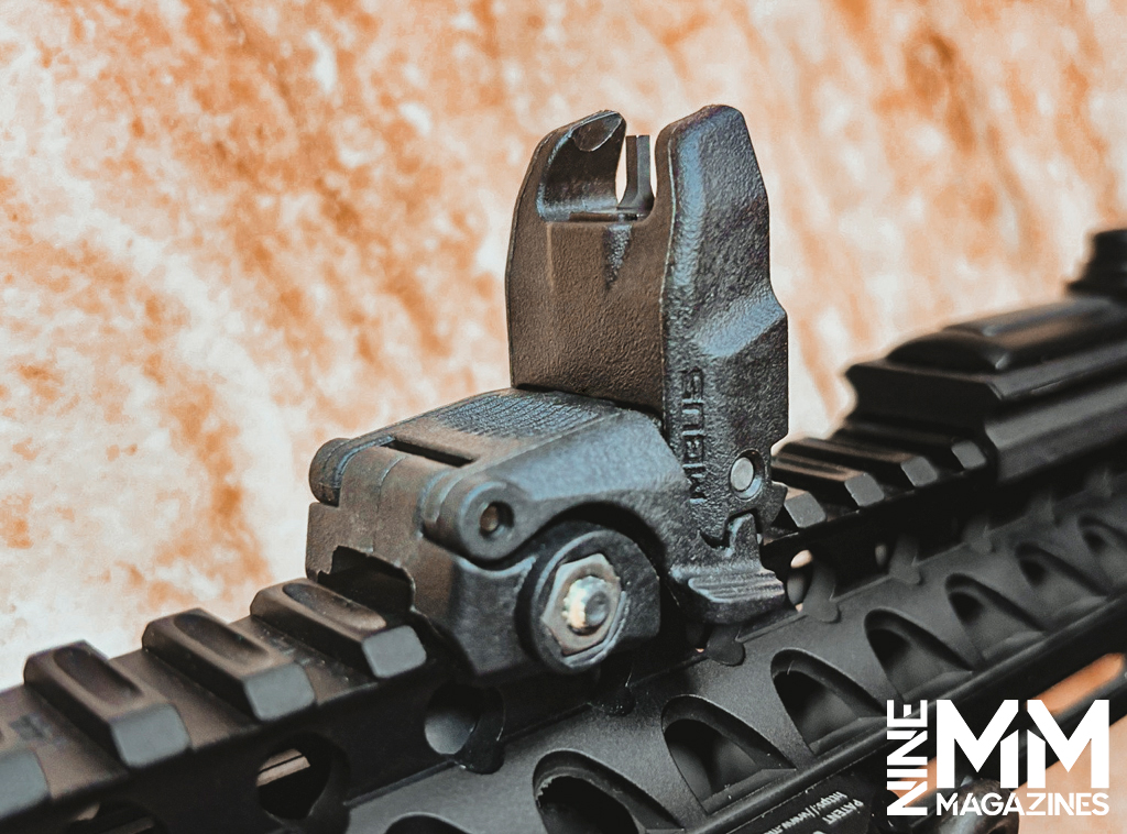 front flip up sight on a rifle a photo of a front flip up sight on a rifle