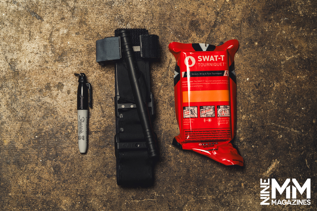 CAT Tourniquet and a SWAT-T Tourniquet with sharpie a photo of CAT Tourniquet and a SWAT-T Tourniquet with sharpie